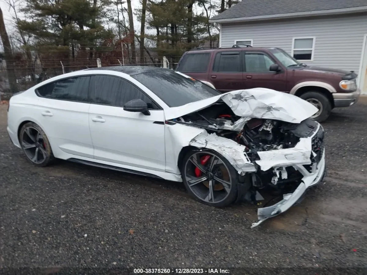 2023 Audi RS 5 — auction record showing severe front-end collision damage
